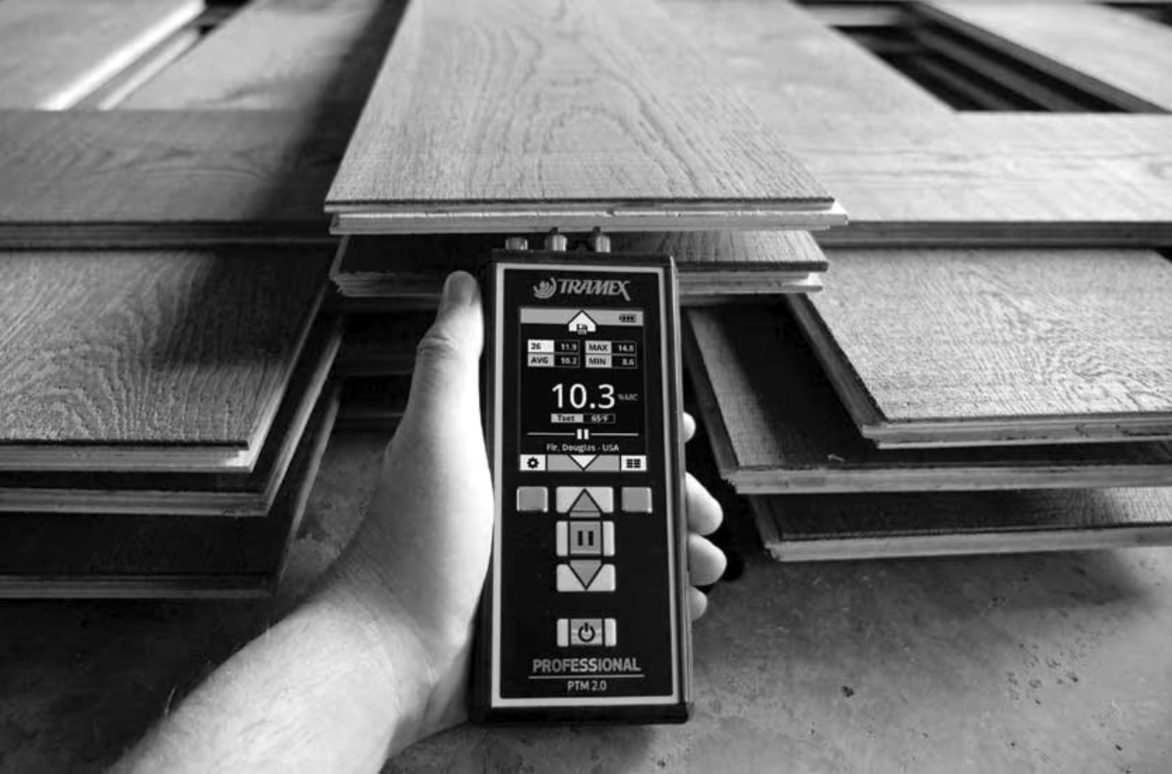 A key part of furniture quality control: checking the moisture content of raw wood